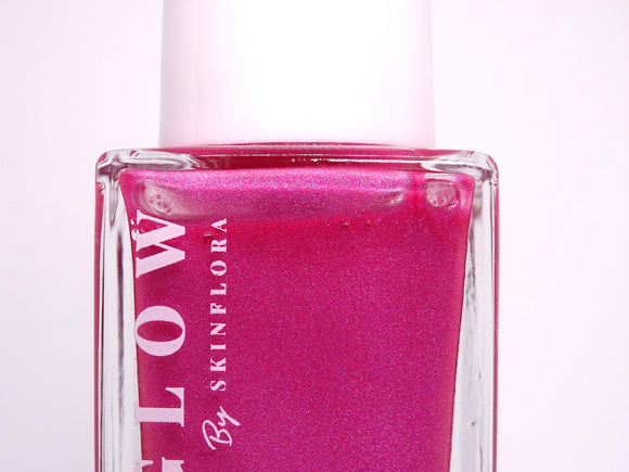 LumiGlow Body Highlighter bottle with radiant pink glow formula