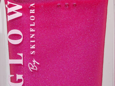 LumiGlow Body Highlighter shimmering glow texture in bottle