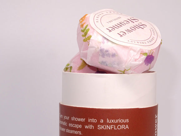 Stacked scented shower steamers close up