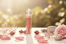 Renew Lip Gloss displayed with soft lights and decorative elements