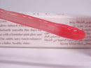 Renew Lip Gloss applicator wand with glossy texture