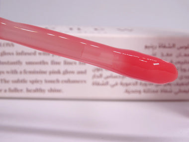 Renew Lip Gloss applicator wand with glossy texture